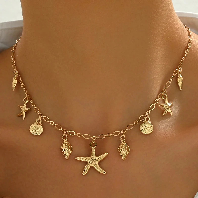 Halsband med snäcka och sjöstjärna