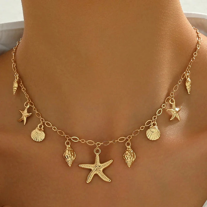 Halsband med snäcka och sjöstjärna