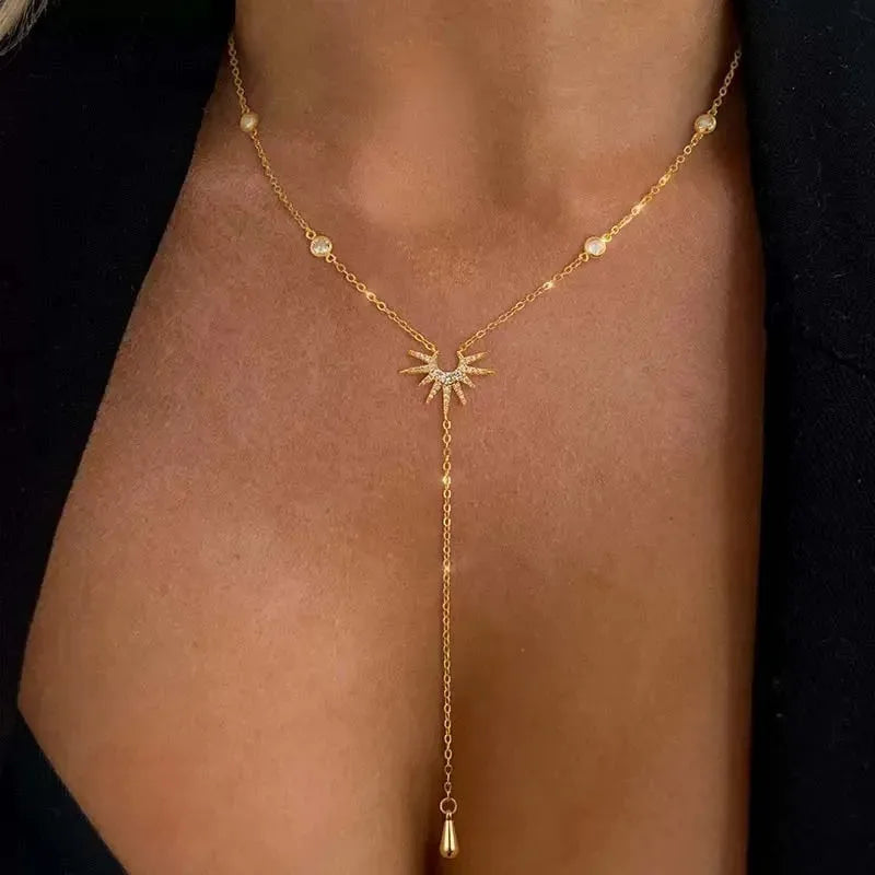 Y-halsband med solhänge – guldfärgat stål