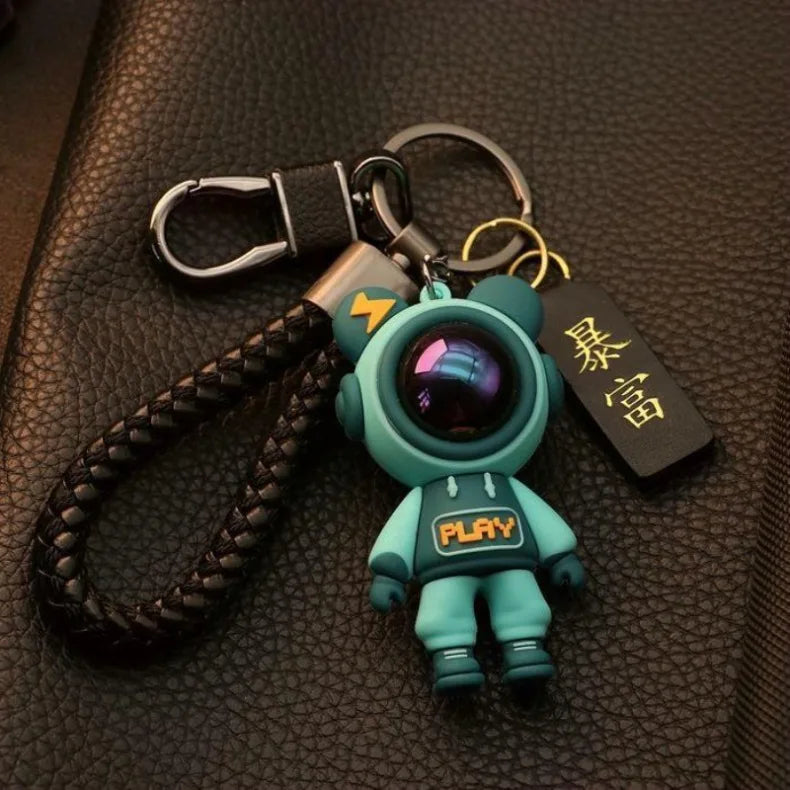 Stjärnhimmel-nyckelring – astronautmotiv