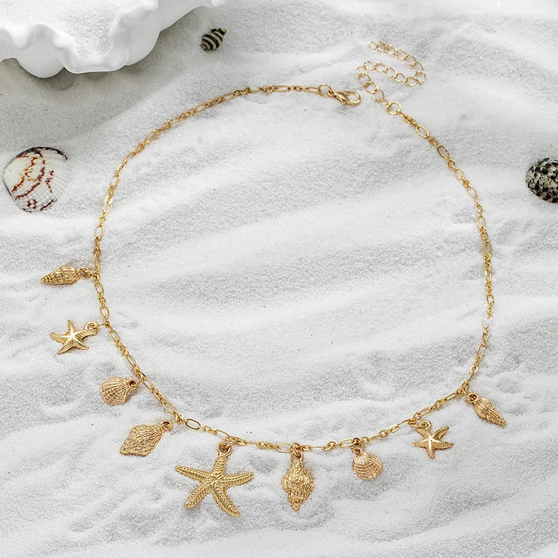 Halsband med snäcka och sjöstjärna